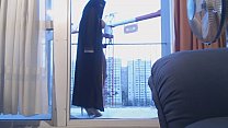 best veiled muslim dancing on the balcony in front of a crane operator best
